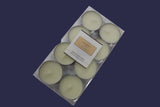 Set of eight white candles in a clear plastic packaging on a white background